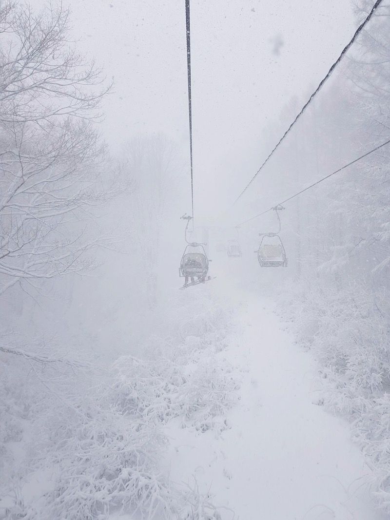 The chairlift on a snowy day in mountain Myoko Japan